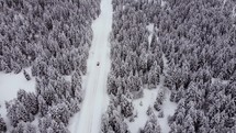 Snowy nature aerial and car driving