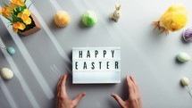 Happy Easter Sign on grey Background 