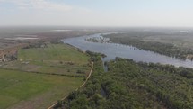 aerial view over river and rural landscape 