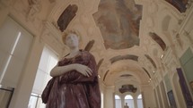 Paris, France - March 20, 2024: The ceiling decorations inside the Petit Palais, Paris, showcase intricate paintings, artistic designs and statues.