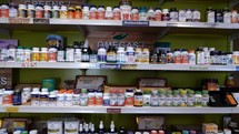 Vitamins and supplements on shelves at a health food store 