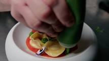 Green Vegetarian Sauce On The Stuffed Pasta Dish 