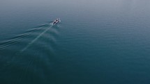 Drone footage overlooking a boat in the Sea of Galilee in Israel