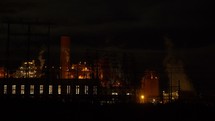 An electric power generating plant at night