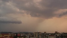 Rain clouds at sunset. Timelapse