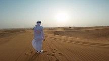 Man In The Desert Enjoying The WInd Of Freedom