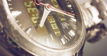 Macro footage of a hand watch with the seconds hand ticking