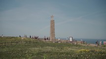 Tourists at Cabo da Roca, or Cape Roca, in Sintra, Portugal, the westernmost point of mainland Europe.