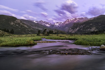 Moraine Park in all her glory during a summer morning sunrise. The Big Thompson River flowing through the meadow