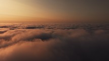 Flying in heavenly clouds during sunrise