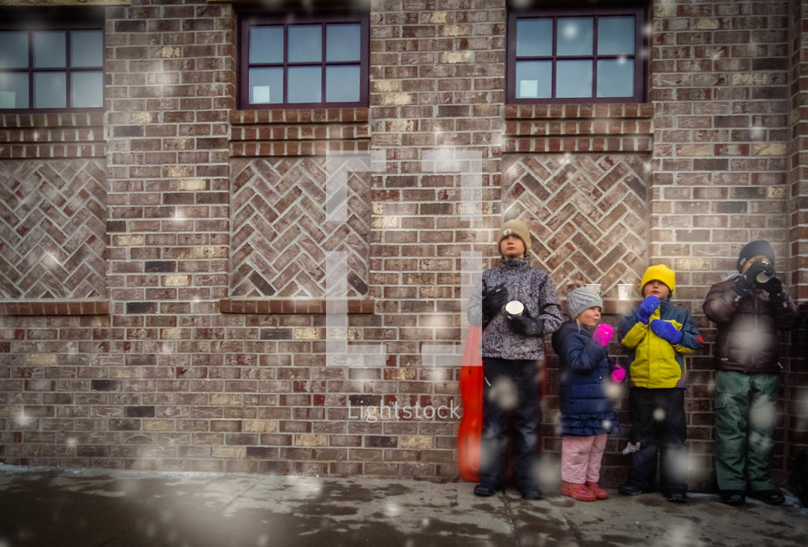 kids waiting outdoors in winter 