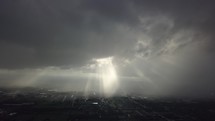 sunbeams through the clouds 