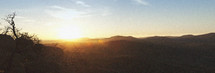panorama of sunset over rolling hills