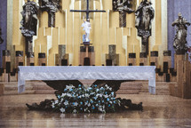 flowers in front of an altar 