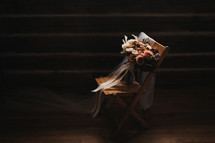 bouquet of flowers in a chair 