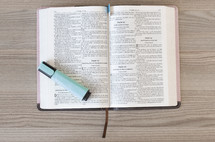 highlighter on the pages of a Bible 