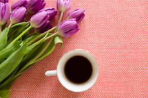 tulips on pink and coffee 