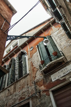 shutters on windows of old buildings in Venice 