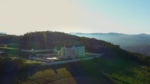 Monastery and school drone shot during sunrise 