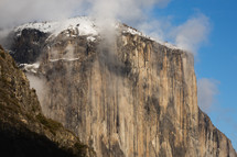 Snowy mountain in Yosemite with clouds