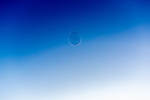 bubble against a blue background 