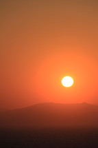 Red and orange sunset/sunrise in the desert