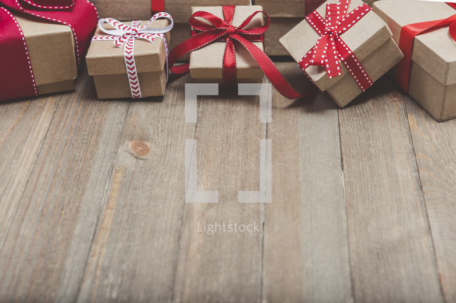 Christmas gifts on a wood background 