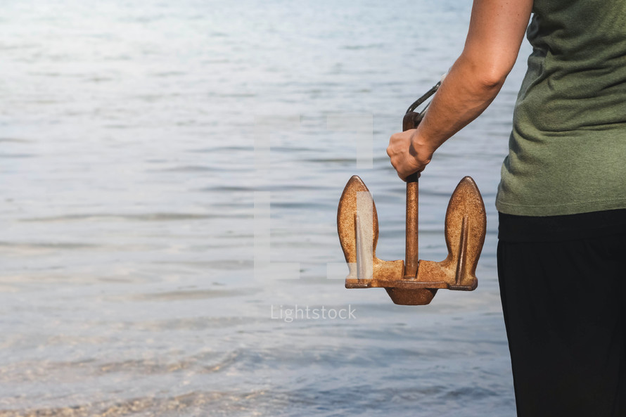 a person holding an anchor