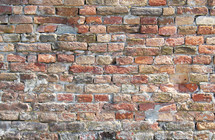 Rustic, hand made, brick wall background 