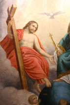 painting of Jesus holding a cross 