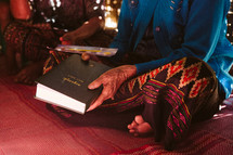 woman holding a Bible in Myanmar