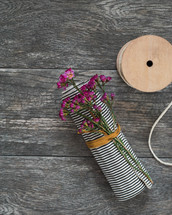 twine, colored pencils, bag, art suppiles, wildflowers 
