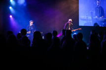 musicians on stage at a youth rally