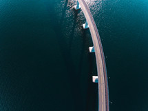 aerial view over a bridge over water 