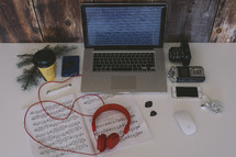 laptop, headphones, sheet music, pine boughs, mouse, laptop, iPhone, earbuds, blog, camera, lens, photography, photo editing, coffee cup, desk 