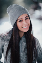 young woman in a beanie 