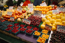 Kumquats and berries in a market 
