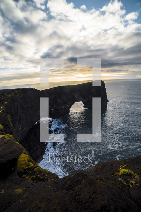 arched cliffs along a shoreline 