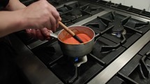 Cooking The Sauce In The Pot Of The Kitchen 