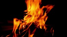 A campfire burning at night