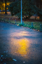 light glowing on pavement 