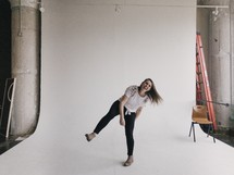 playful woman in a photo studio 