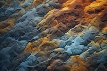 Colorful abstract background of the cracked surface of the earth. Toned. Texture