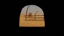 view of the desert through a window 