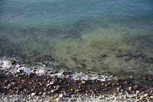 tide washing onto a rocky shore 