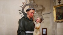 Statue of saint joseph with baby Jesus