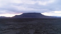 Aerial video of Herðubreið shield volcano in the highlands of Iceland during sunset.
