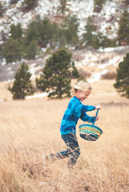 boy running with an Easter basket 