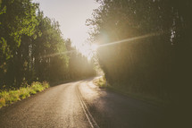 rural road under sunlight 