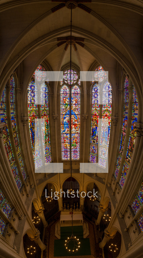 majestic church windows filled with colorful stained glass Montpellier